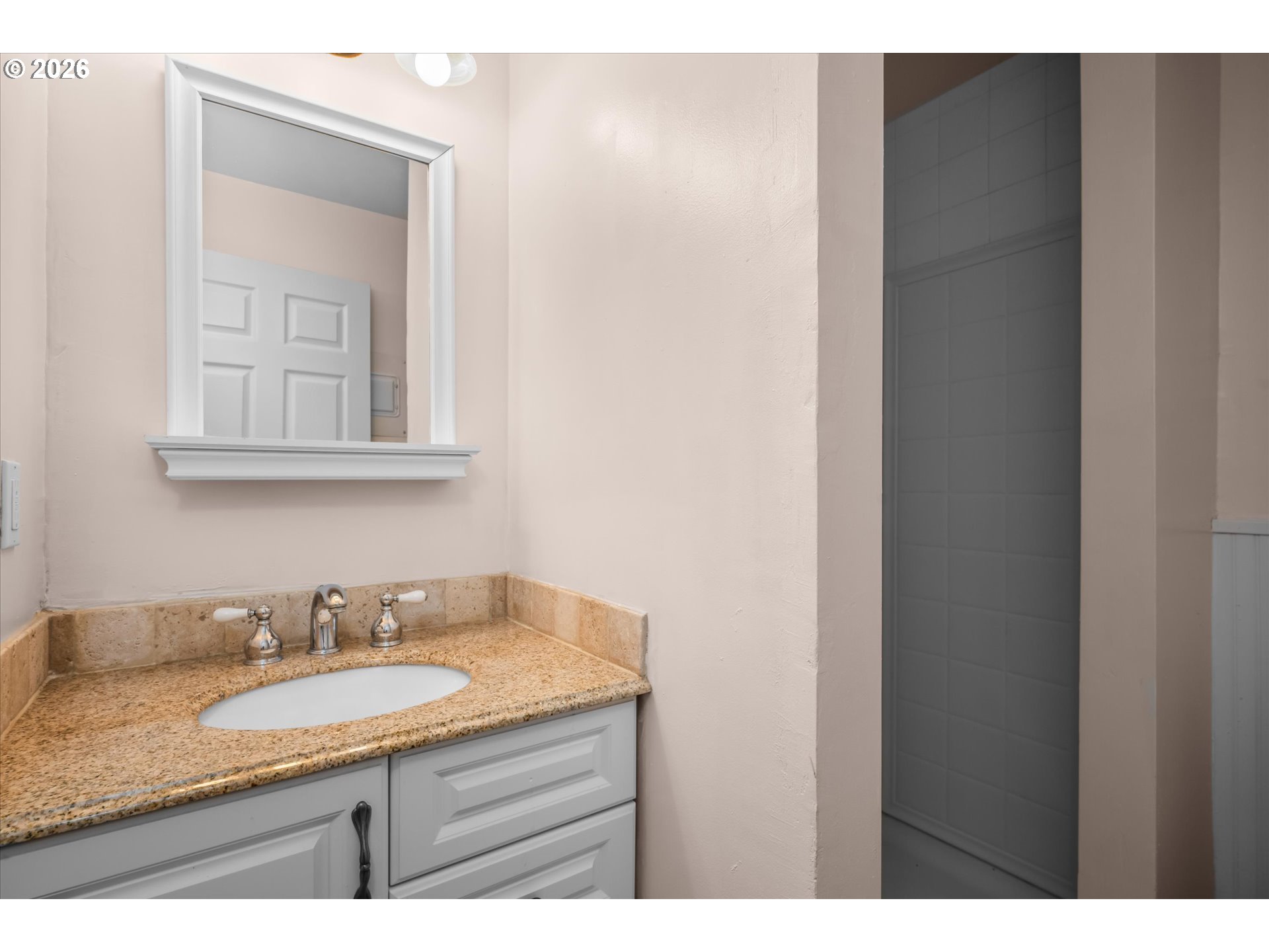 2012 Greiner Street Eugene, OR 97405 - Photo 34 of 45 a bathroom with a granite countertop sink and a mirror