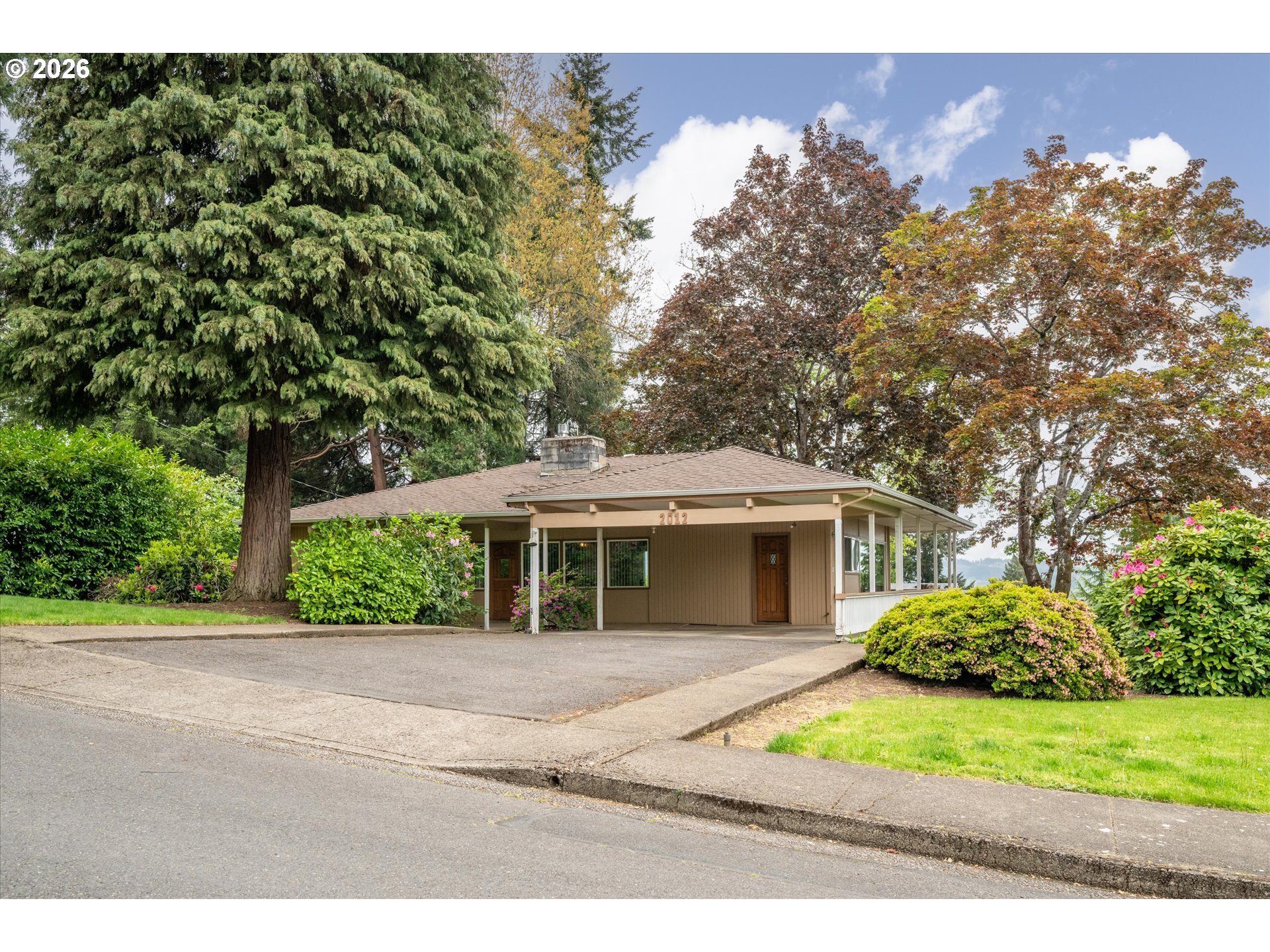 2012 Greiner Street Eugene, OR 97405 - Photo 4 of 45 a view of a house with a yard and potted plants
