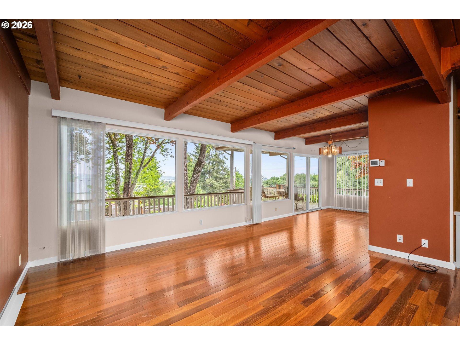 2012 Greiner Street Eugene, OR 97405 - Photo 6 of 45 a view of an empty room with wooden floor and a large window