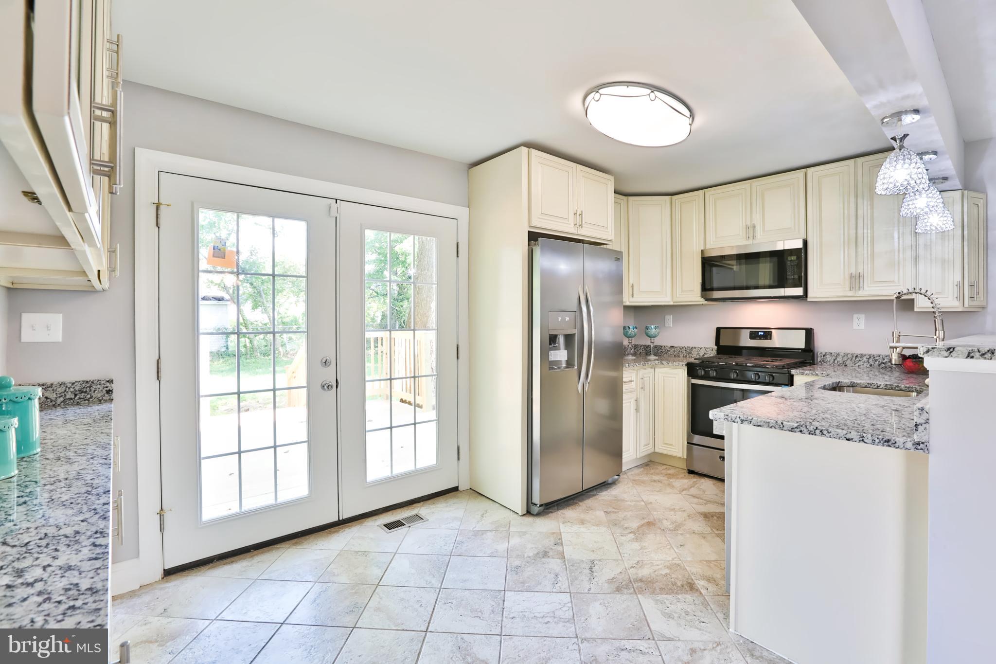 3525 Millvale Road Baltimore, MD 21244 - Photo 1 of 30 French doors leading to deck and large backyard!