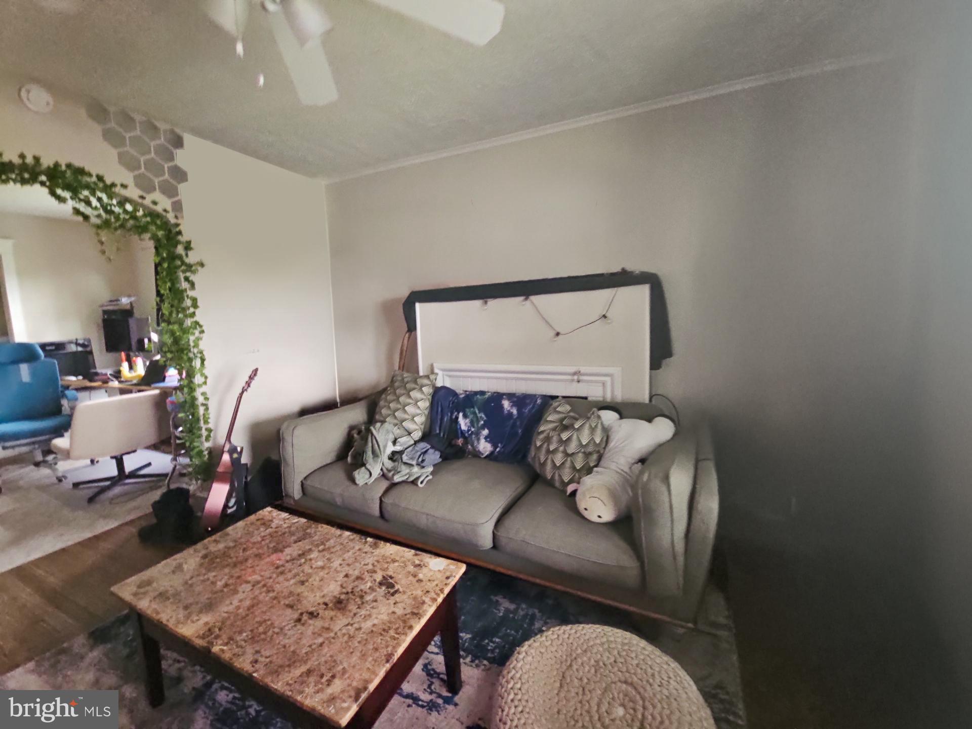 279 Logwood Avenue Carneys Point, NJ 08069 - Photo 3 of 7 a living room with furniture and wooden floor