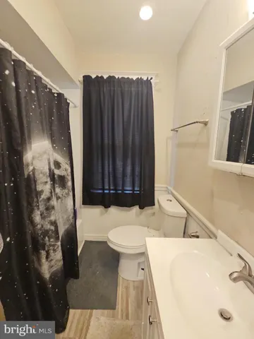 a bathroom with a sink and a toilet