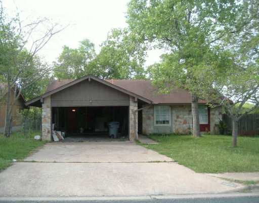 6600 Ripple Run Austin, TX 78744 - Photo 1 of 1 a house with a tree in front of it