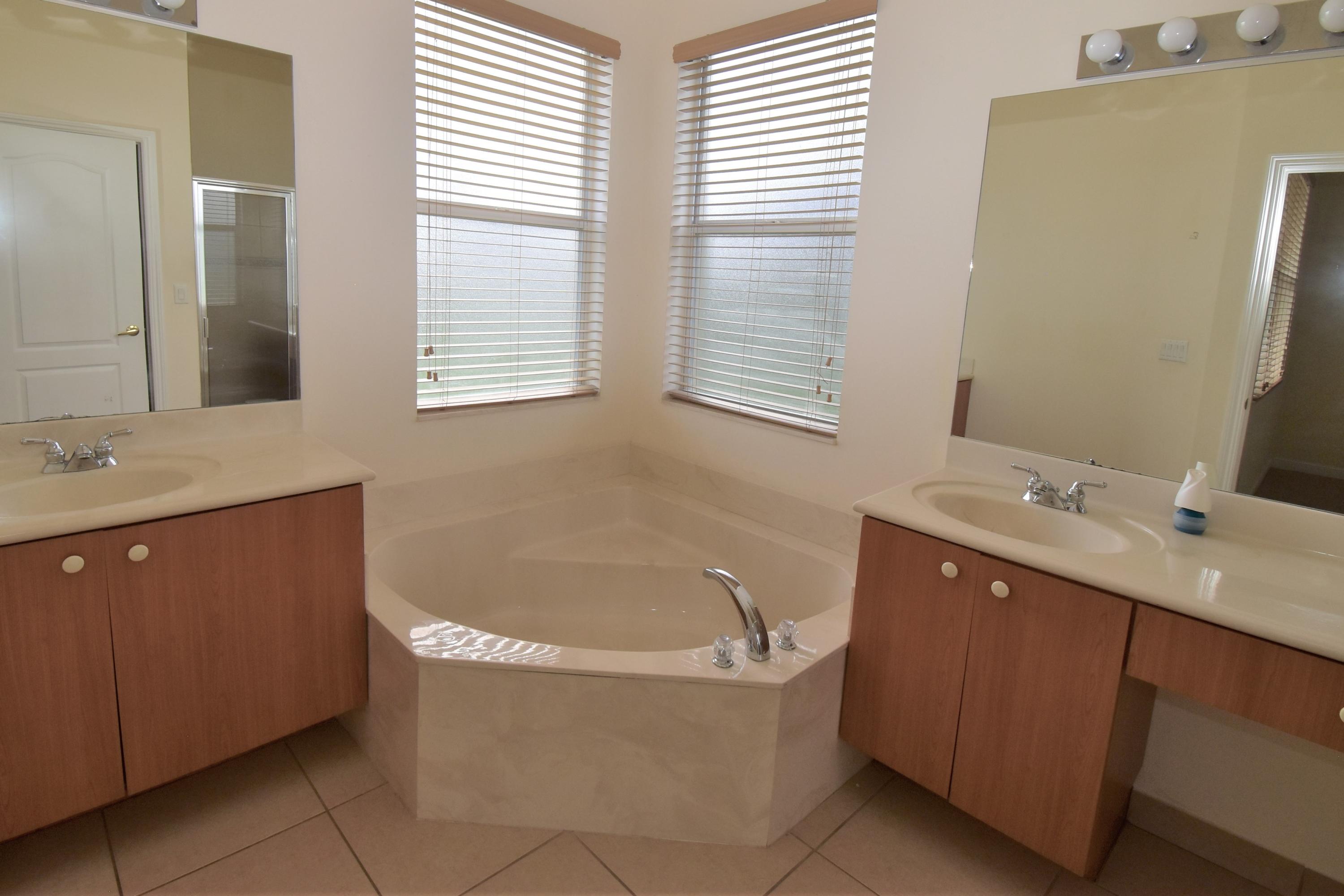 5908 Spanish River Road Fort Pierce, FL 34951 - Photo 17 of 62 15 Master Bath 1