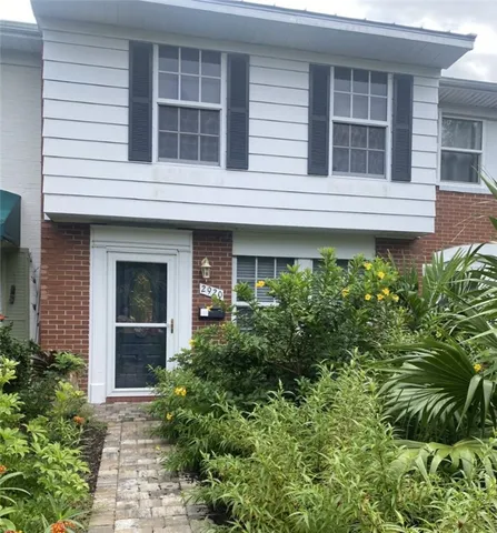a house view with a garden space