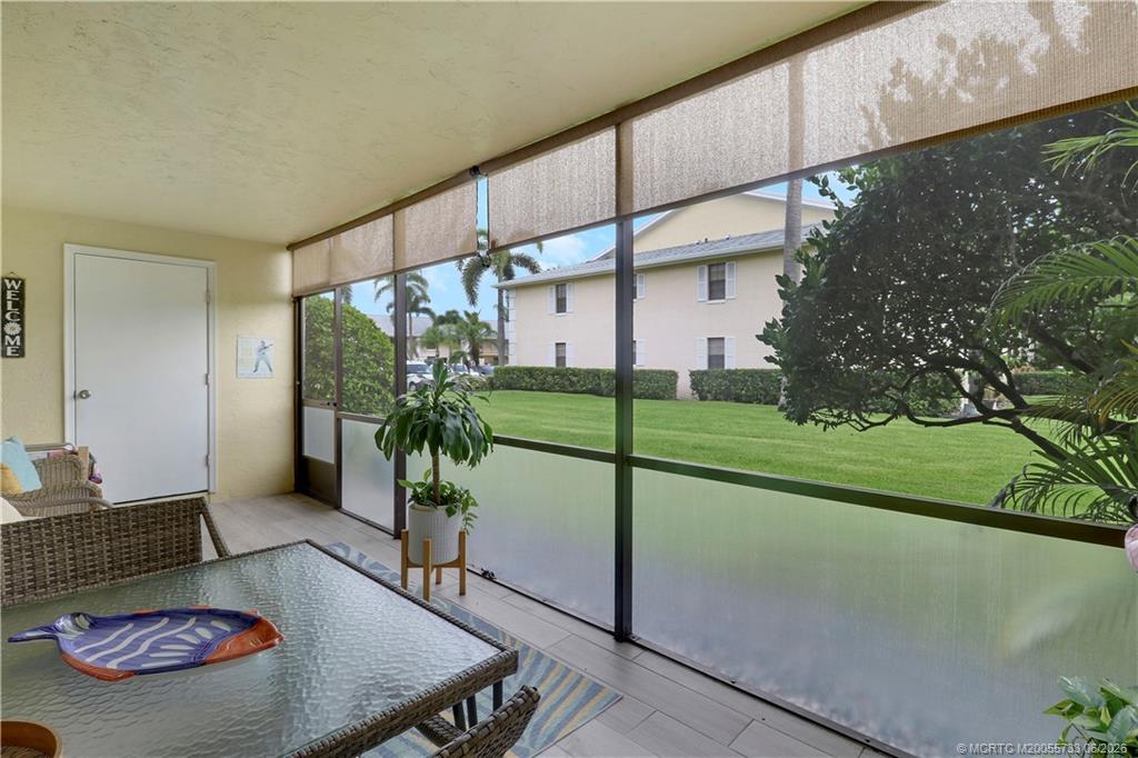 1001 Keystone Drive, Unit A Jupiter, FL 33458 - Photo 22 of 30 a view of a porch with furniture