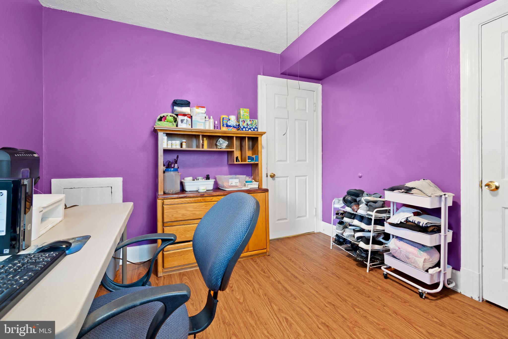 4410 Allies Road Suitland, MD 20746 - Photo 19 of 30 a bedroom with furniture and wooden floor