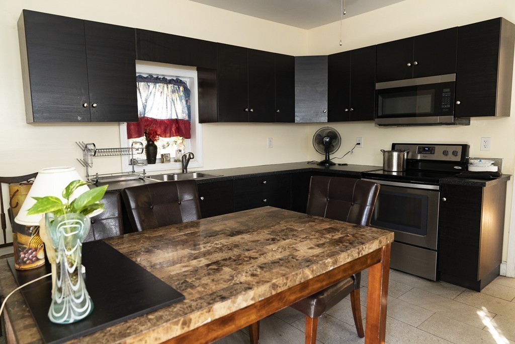 27 Laurel Street Boston, MA 02119 - Photo 1 of 20 Gallery Image 1