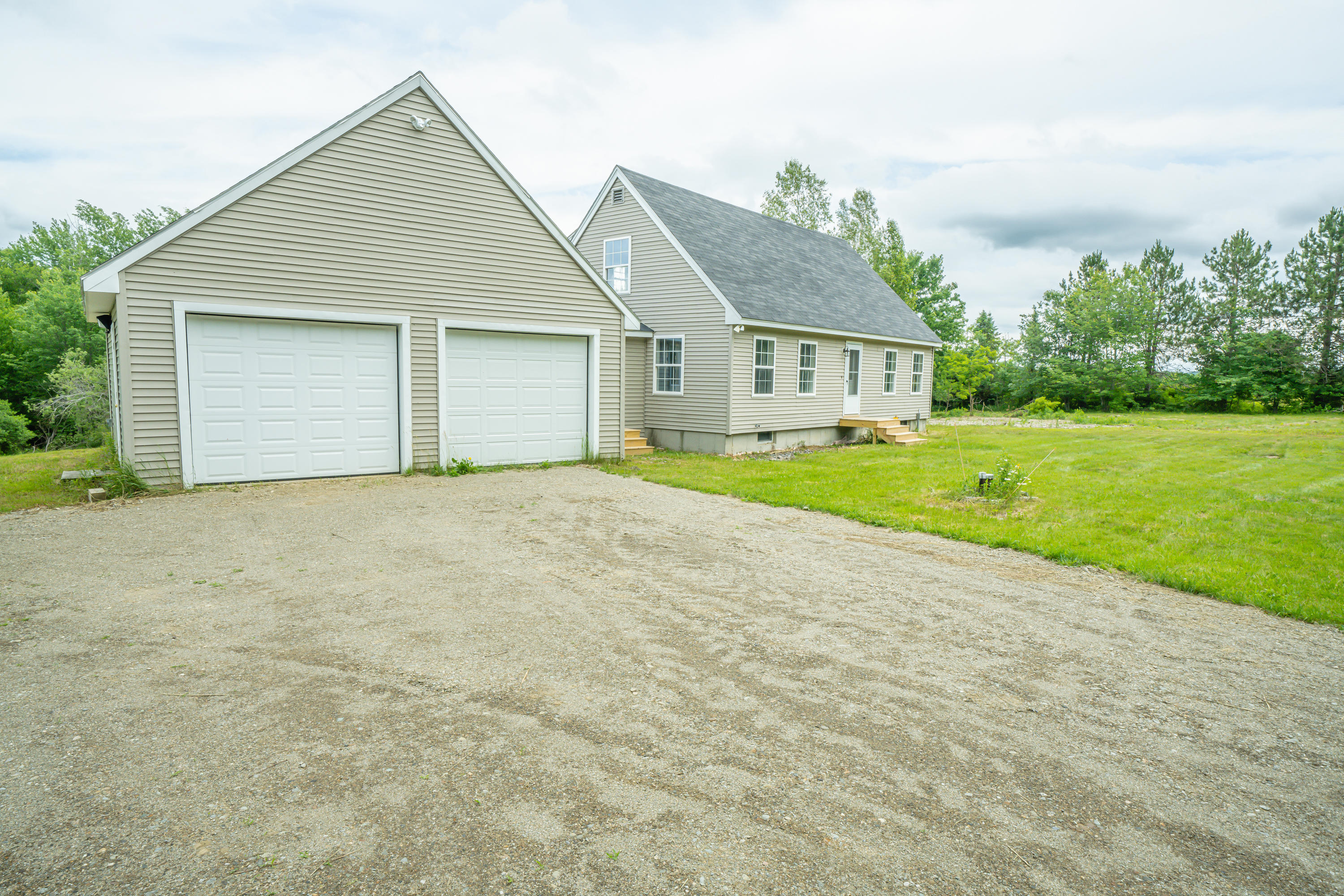52 Brown Road Morrill, ME 04952 - Photo 2 of 24 Front of House - 2 car attached garage