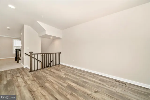 a view of a two chairs in the balcony