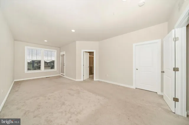 a bathroom with a double vanity sink mirror and shower