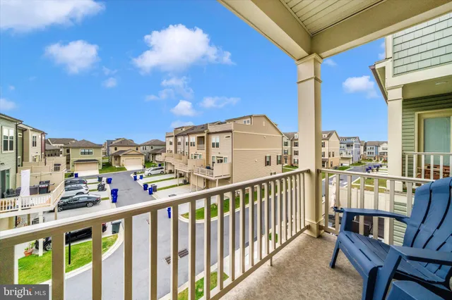 a bathroom with a toilet a sink and a mirror