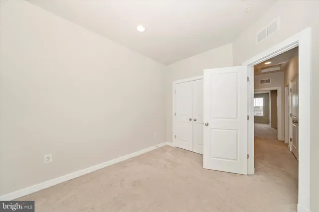 a swimming pool with outdoor seating and yard