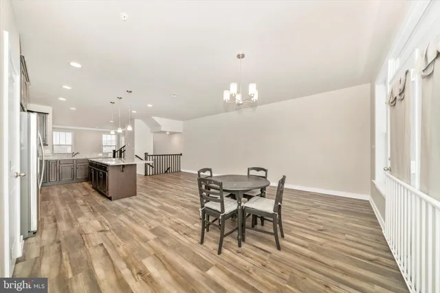 a view of an empty room with stairs