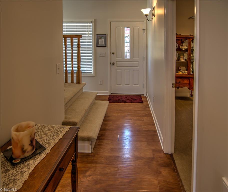 198 Shoreline Road New London, NC 28127 - Photo 19 of 28 Entry, floors are quick step by Thomasville.