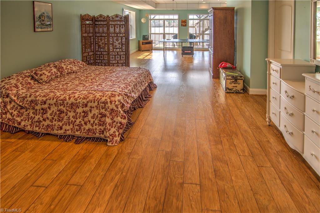 198 Shoreline Road New London, NC 28127 - Photo 24 of 28 Lower level bedroom, with full bath and den or game room.