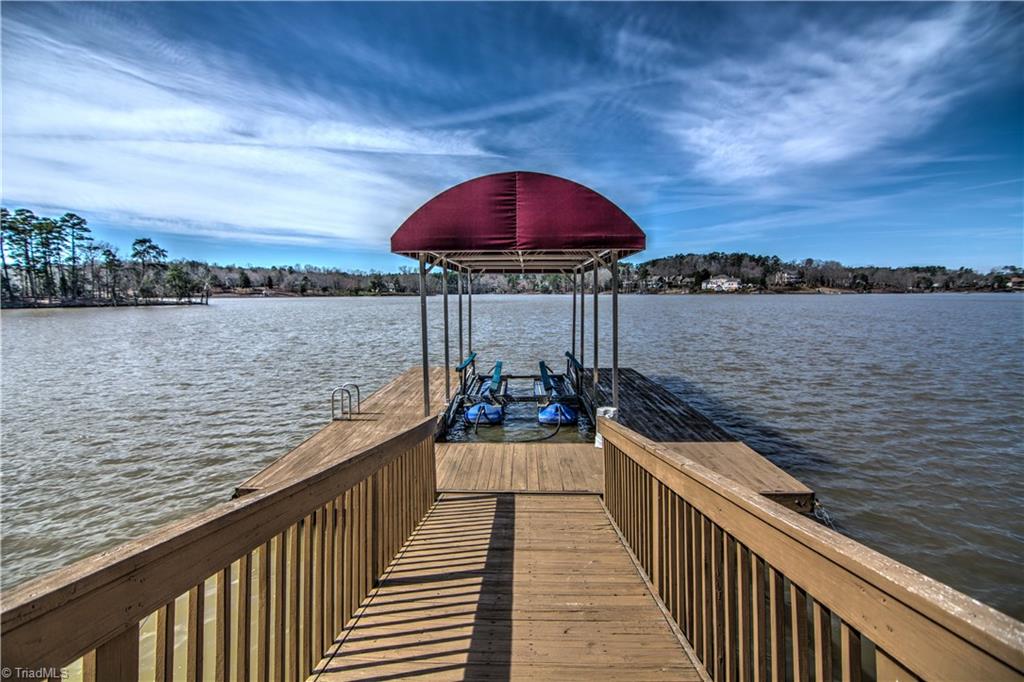 198 Shoreline Road New London, NC 28127 - Photo 5 of 28 U shape covered floater with boat lift.