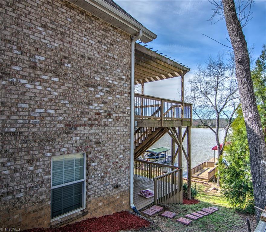 198 Shoreline Road New London, NC 28127 - Photo 9 of 28 Home just recently landscaped, HVAC just serviced and home just painted in 2017.