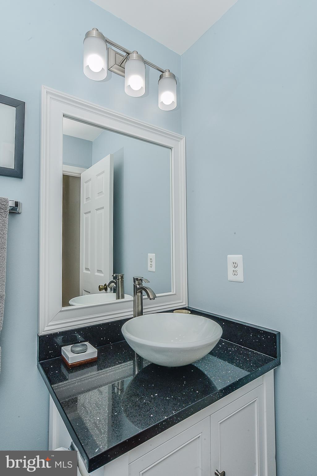 7124 Hamor Lane Springfield, VA 22153 - Photo 16 of 30 Powder room with granite vanity top and vessel