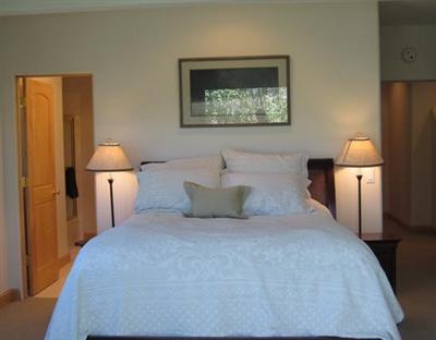 25 Andorra Road Edwards, CO 81632 - Photo 16 of 17 a bed room with a bed and a lamp