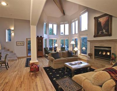 25 Andorra Road Edwards, CO 81632 - Photo 9 of 17 a living room with furniture fireplace and a large window