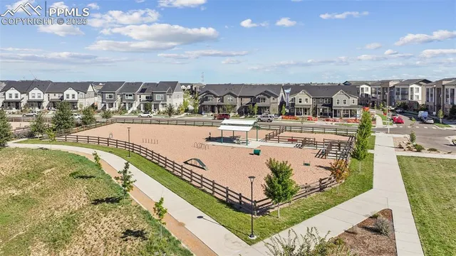 a view of a swimming pool with an outdoor seating