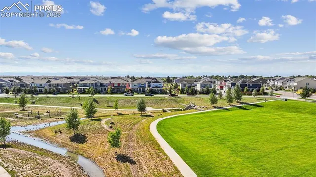 a view of a lake with a yard