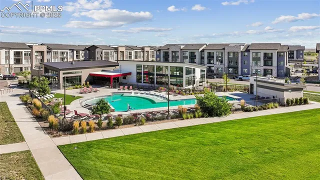 a view of an chairs and table in the patio