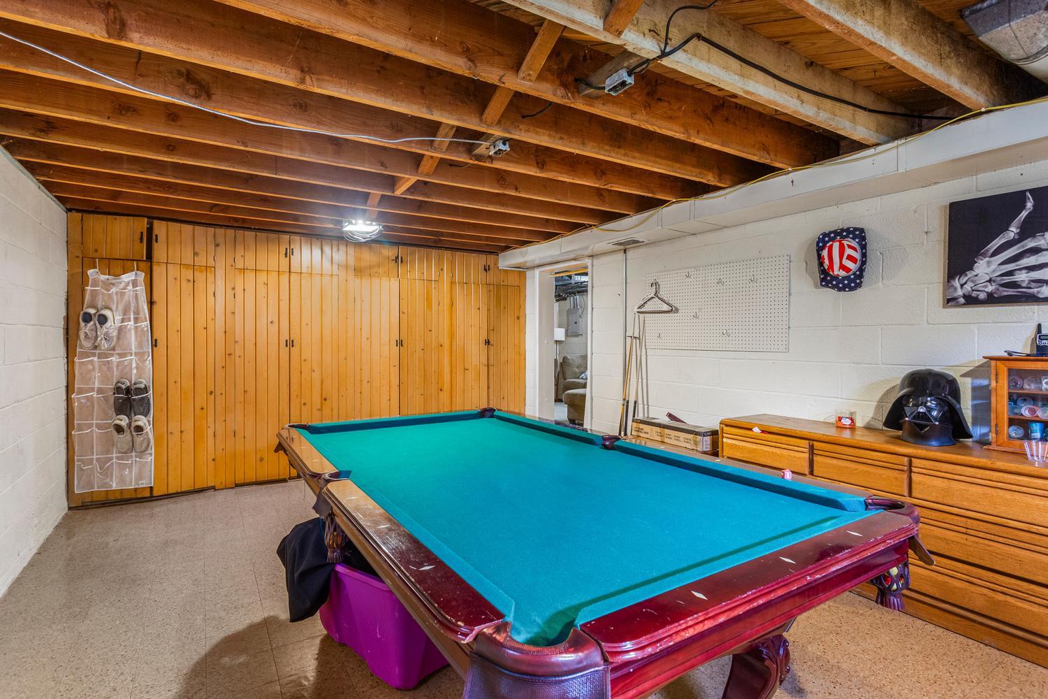 1117 West Union Street Champaign, IL 61821 - Photo 25 of 29 a room with pool table and windows