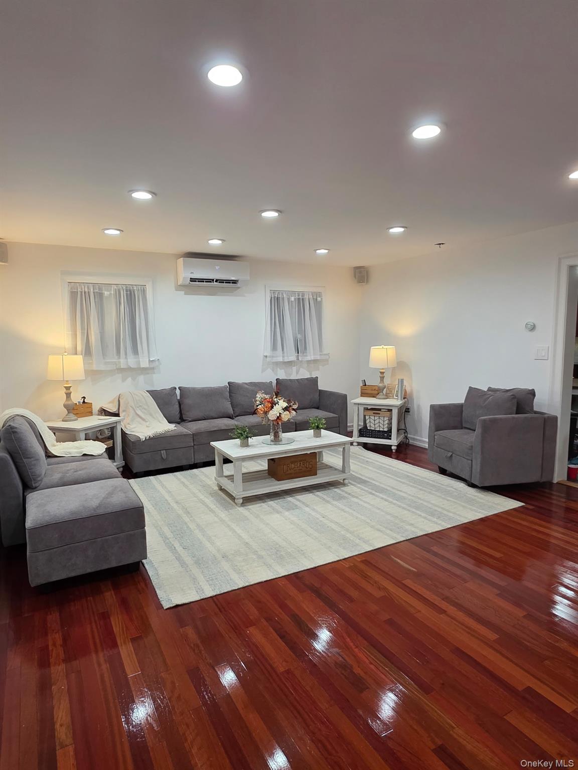 12-14 West 5th Road Queens, NY 11693 - Photo 32 of 43 Living room featuring hardwood / wood-style floors and recessed lighting