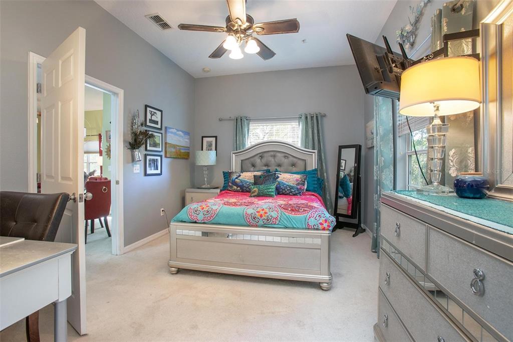 970 North Spring Garden Avenue, Unit 311 Deland, FL 32720 - Photo 16 of 23 a bedroom with a bed and window