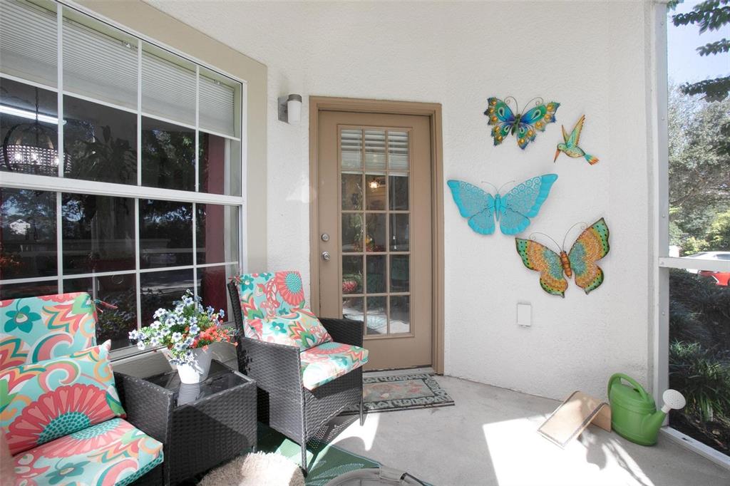 970 North Spring Garden Avenue, Unit 311 Deland, FL 32720 - Photo 20 of 23 a living room filled with furniture