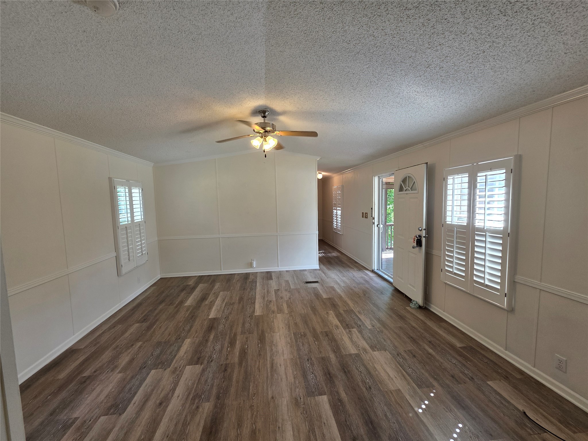 70 Montego Way Point Blank, TX 77364 - Photo 35 of 41 wooden floor in an empty room with a window