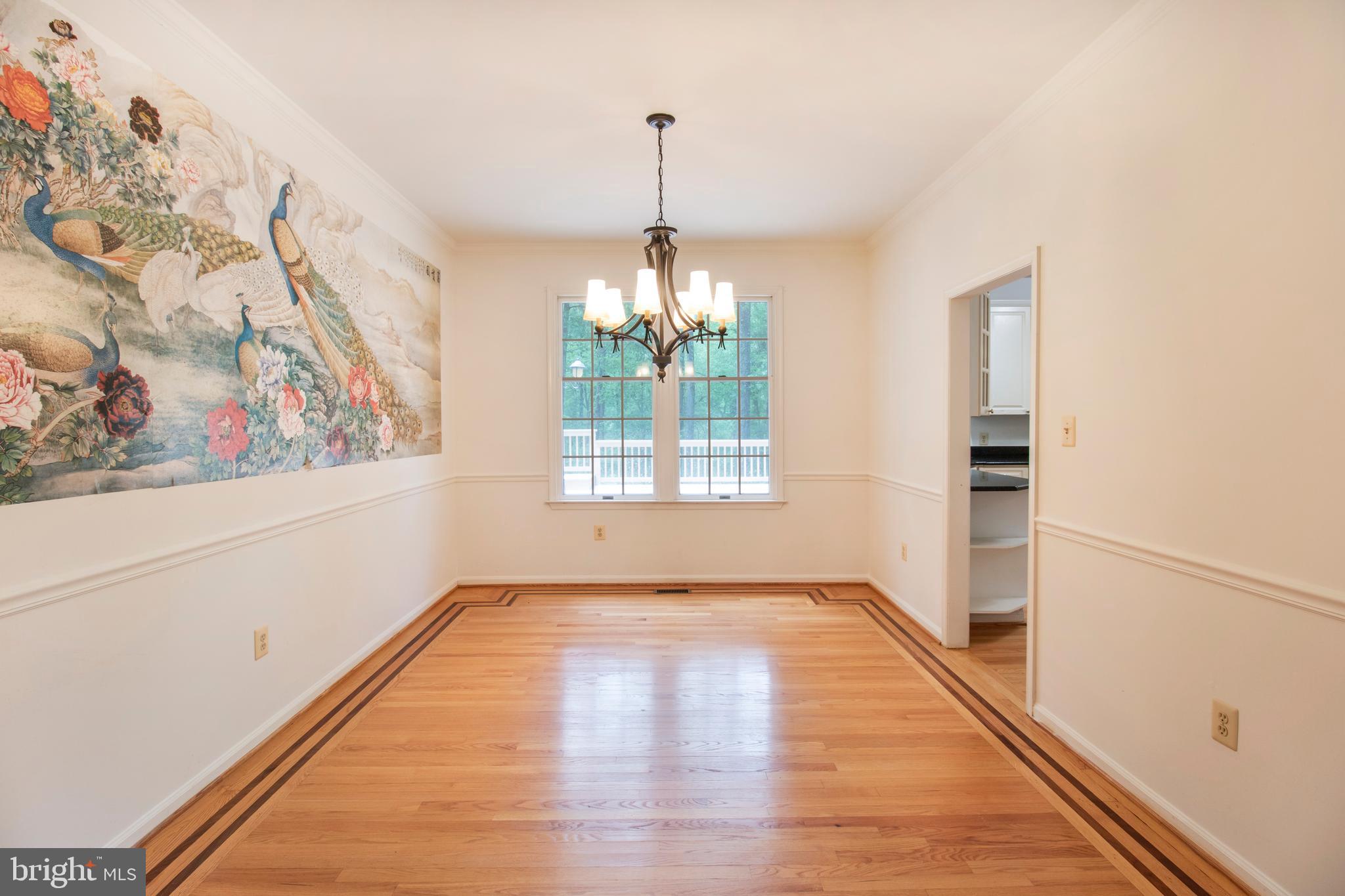 15302 Sweetridge Road Silver Spring, MD 20905 - Photo 14 of 106 a view of a room with window and wooden floor