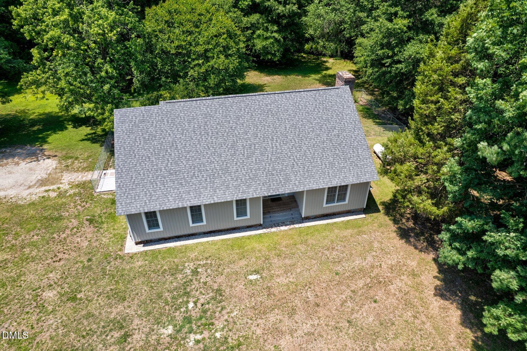 726 Thomas Road Rocky Mount, NC 27801 - Photo 49 of 55 an aerial view of a house with a yard