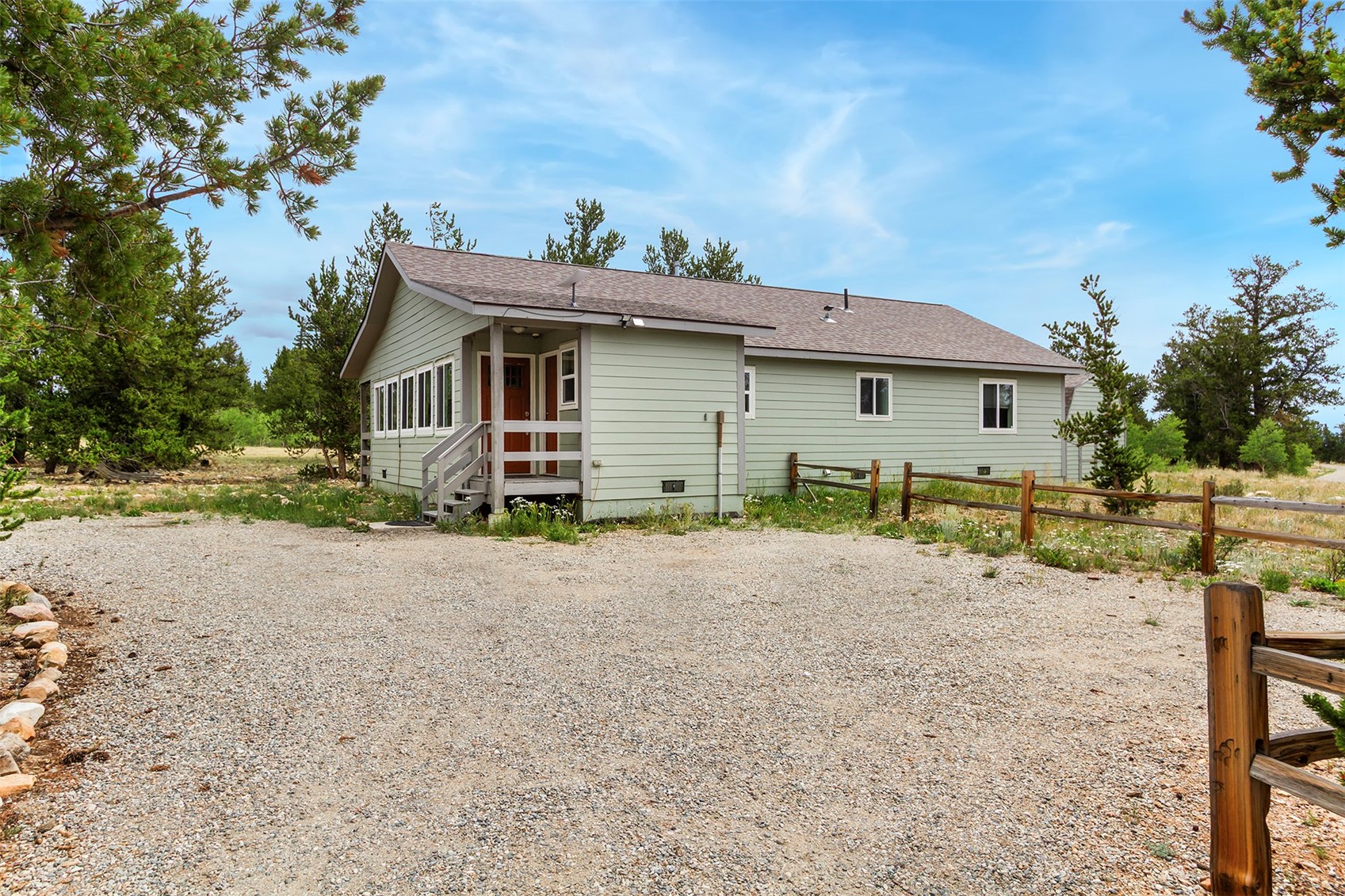 485 High Creek Road Fairplay, CO 80440 - Photo 27 of 32 Back of house with crawl space, a shingled roof, and driveway