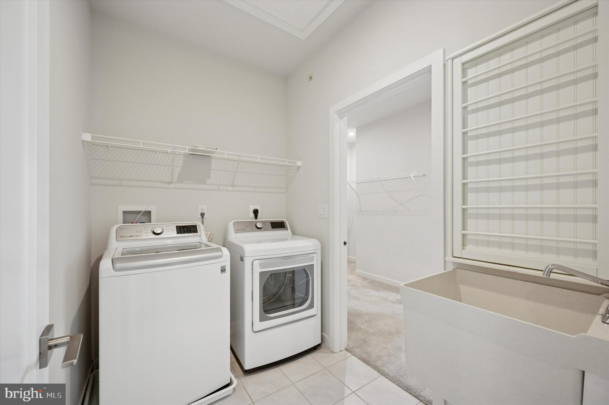 3174 Wier Drive East, Unit E Warrington, PA 18976 - Photo 26 of 37 a utility room with dryer and washer