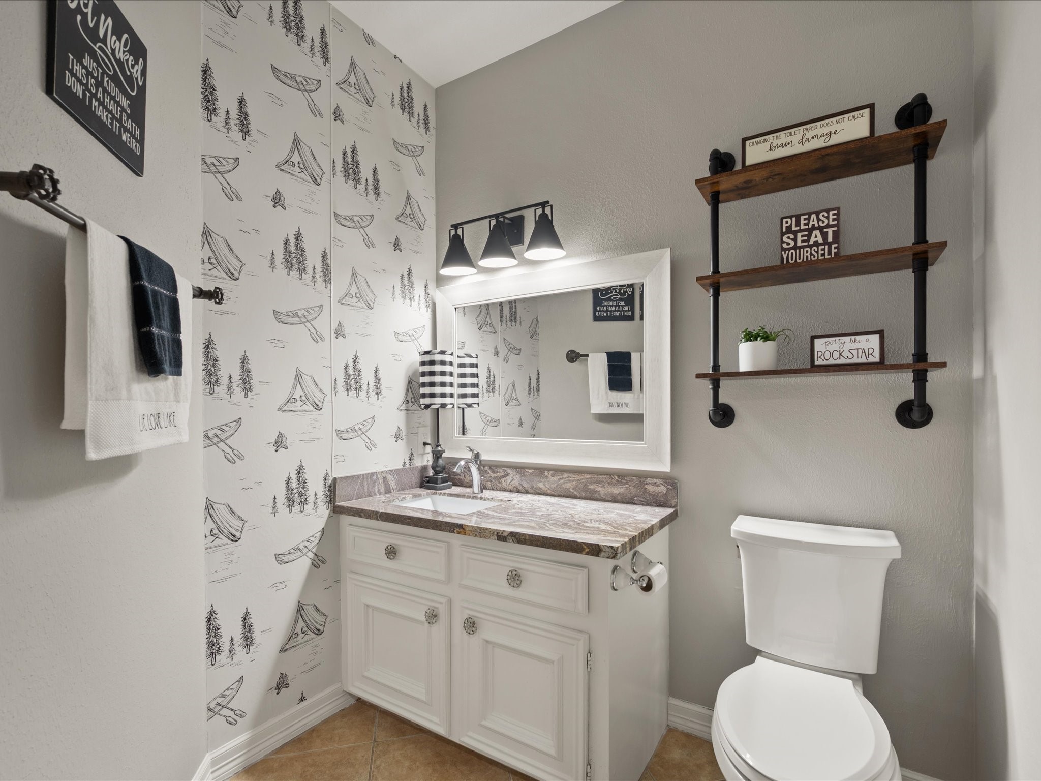 2906 Penninsula Point Montgomery, TX 77356 - Photo 16 of 48 Elegant half bath perfect for
convenience and comfort.