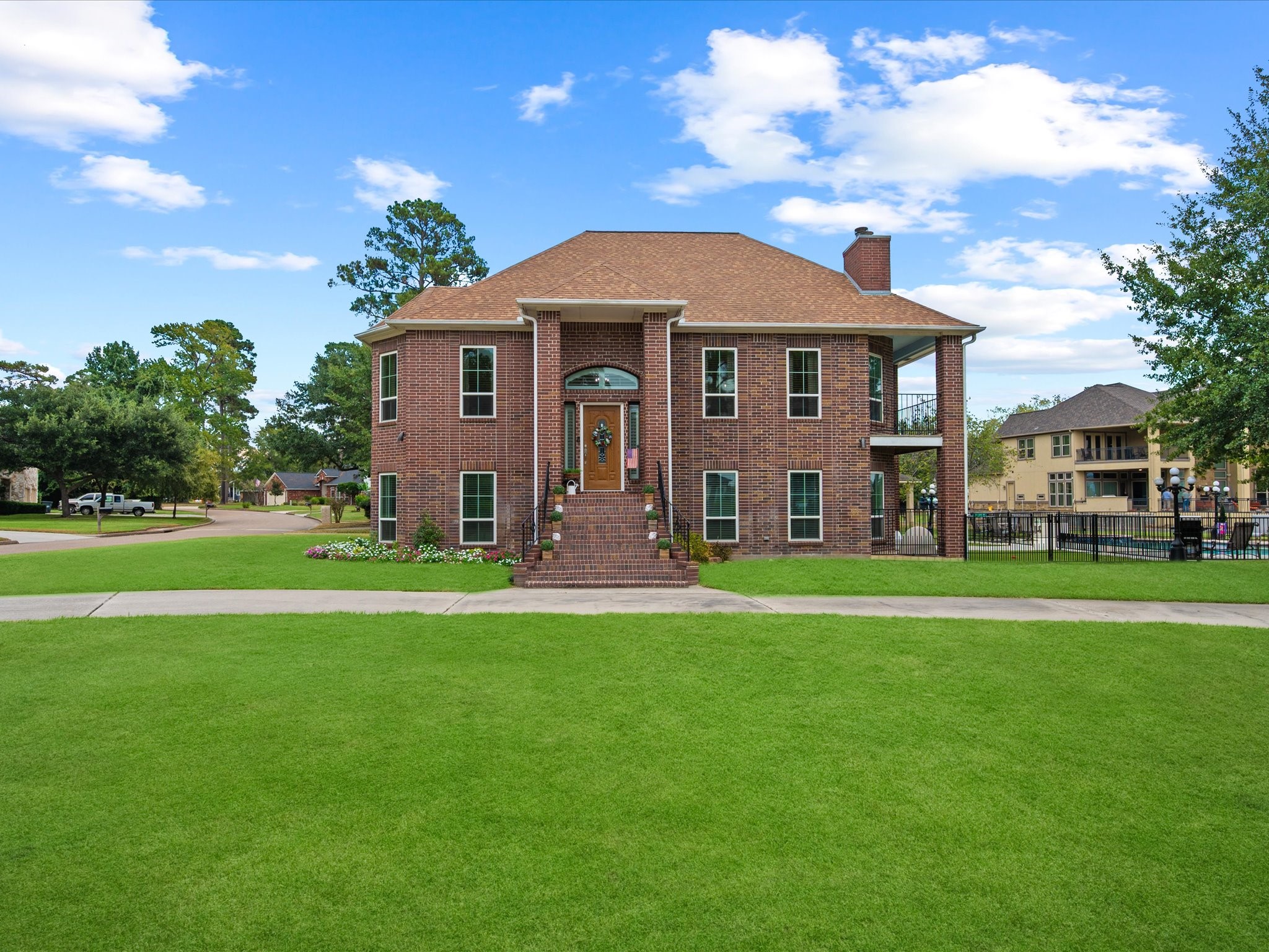 2906 Penninsula Point Montgomery, TX 77356 - Photo 2 of 48 This beautifully designed brick
two-story offers timeless
elegance with serene lake views
and an inviting outdoor space
perfect for entertaining or
relaxing by the water.