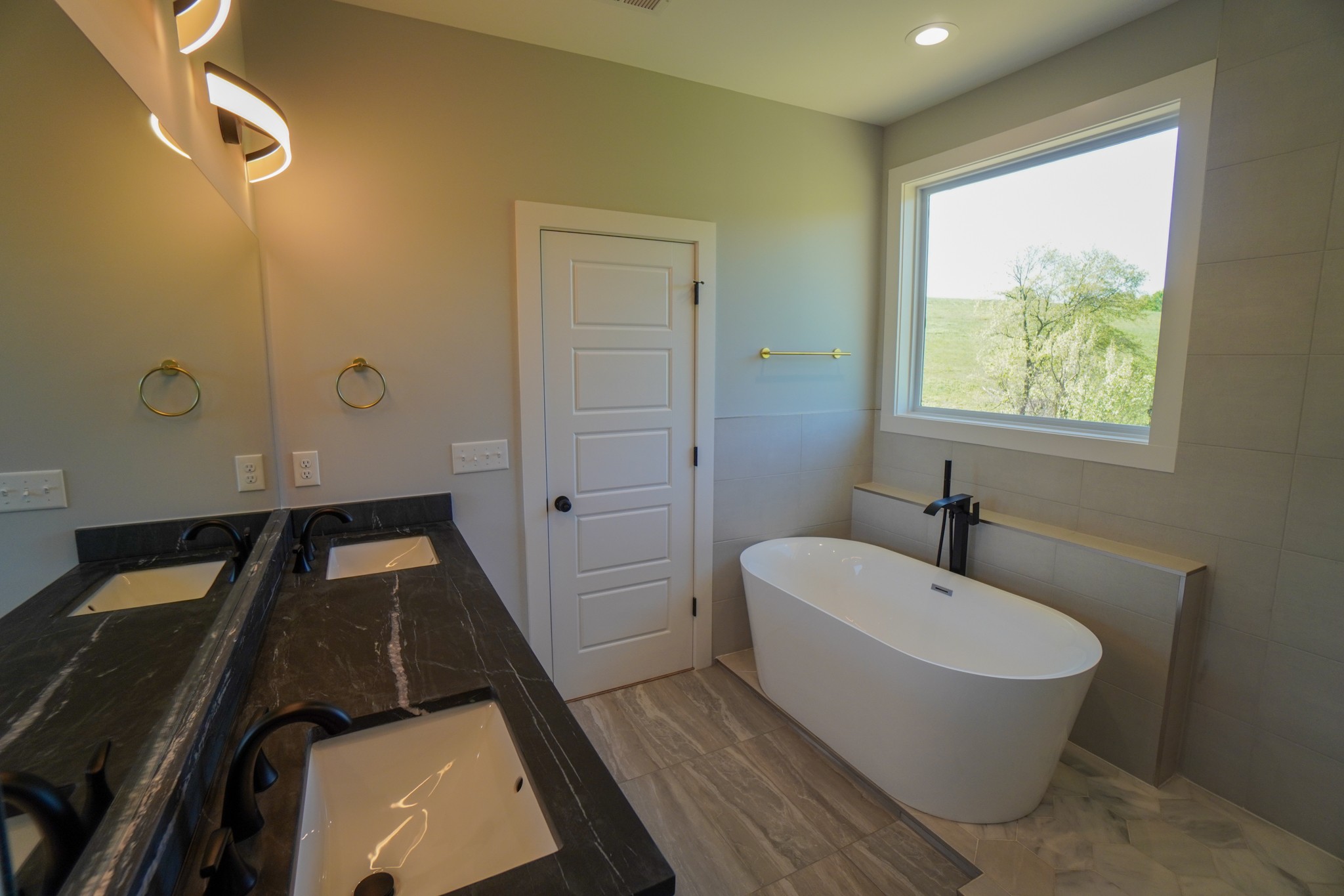 3035 Wixtown Road Westmoreland, TN 37186 - Photo 2 of 8 a bathroom with a sink and a bathtub