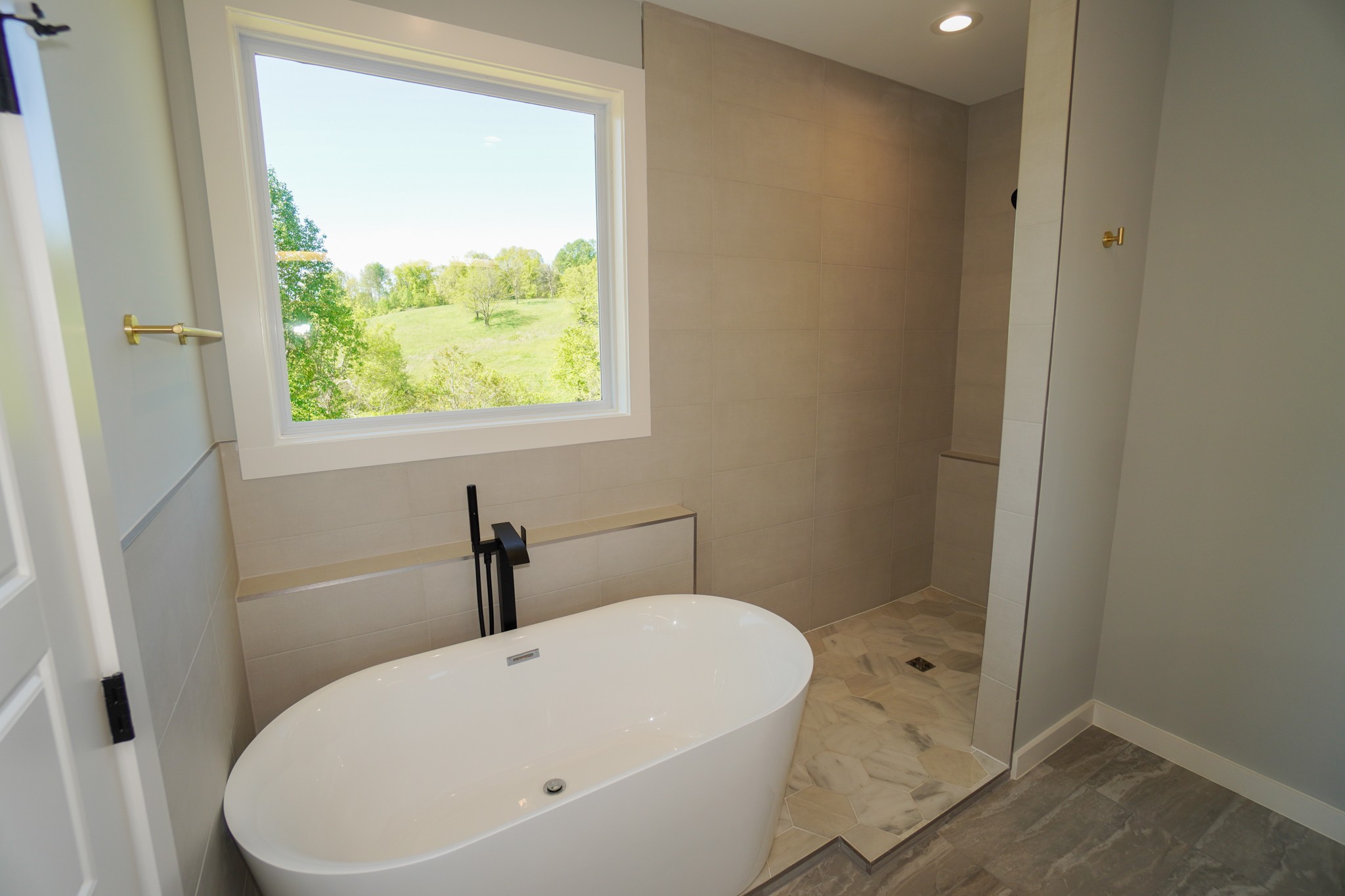 3035 Wixtown Road Westmoreland, TN 37186 - Photo 5 of 8 a white bath tub sitting next to a white sink