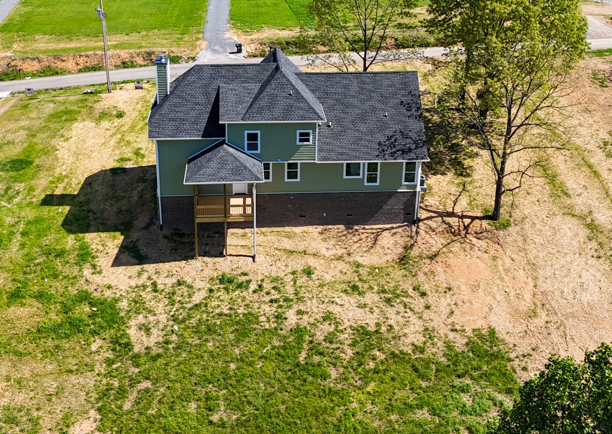 3035 Wixtown Road Westmoreland, TN 37186 - Photo 8 of 8 a front view of a house with a yard