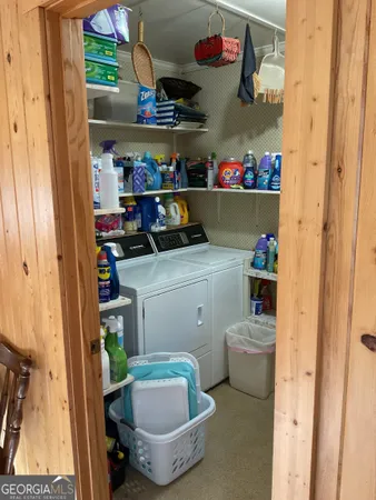 a bathroom with a sink and a window