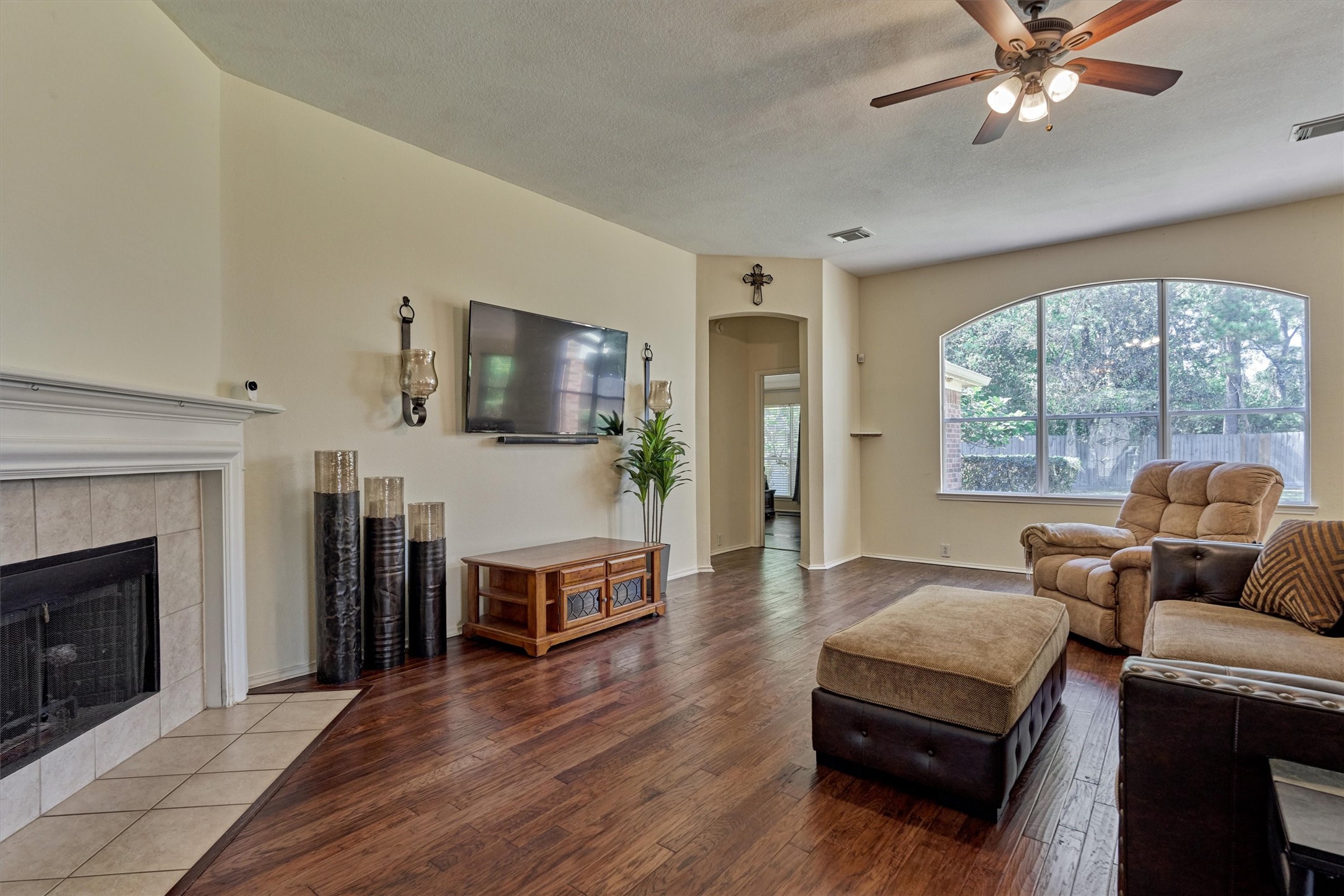 20835 Louetta Oak Drive Spring, TX 77388 - Photo 20 of 37 a living room with furniture and a fireplace