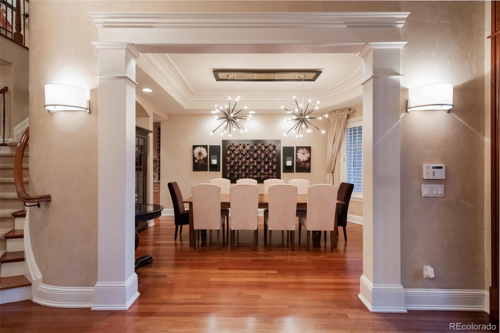3 Sandy Lake Road Englewood, CO 80113 - Photo 11 of 35 a view of a very nice looking dining room with furniture and wooden floor