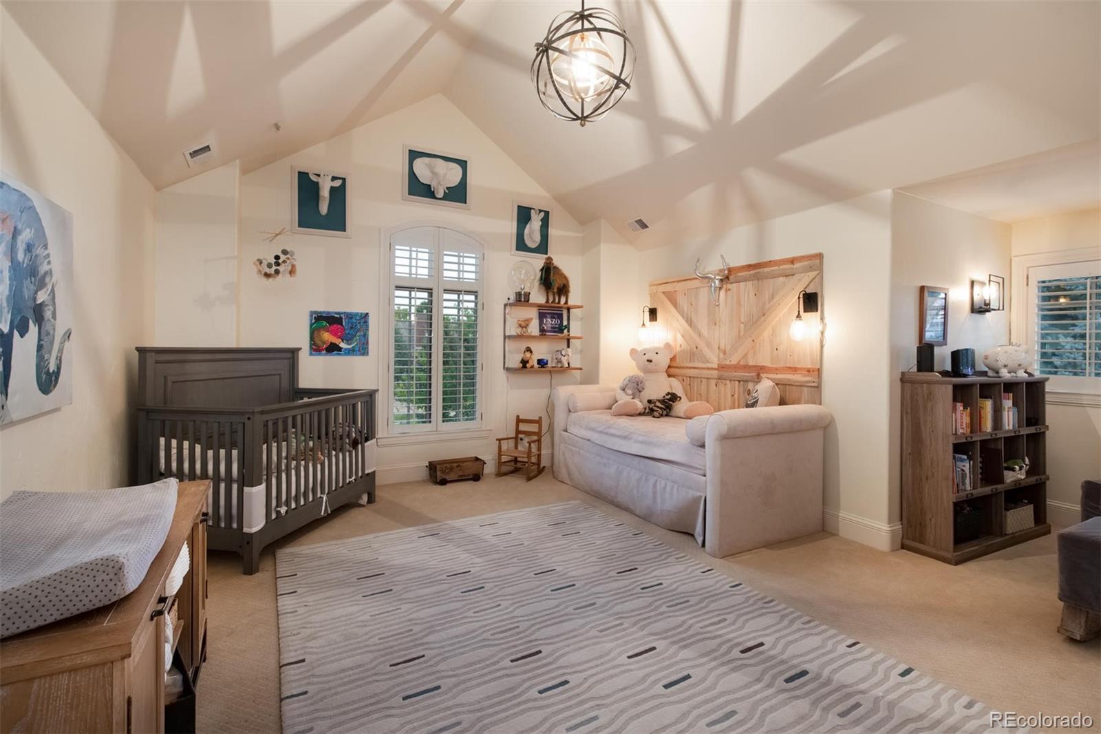 3 Sandy Lake Road Englewood, CO 80113 - Photo 23 of 35 a living room with furniture and a wooden floor