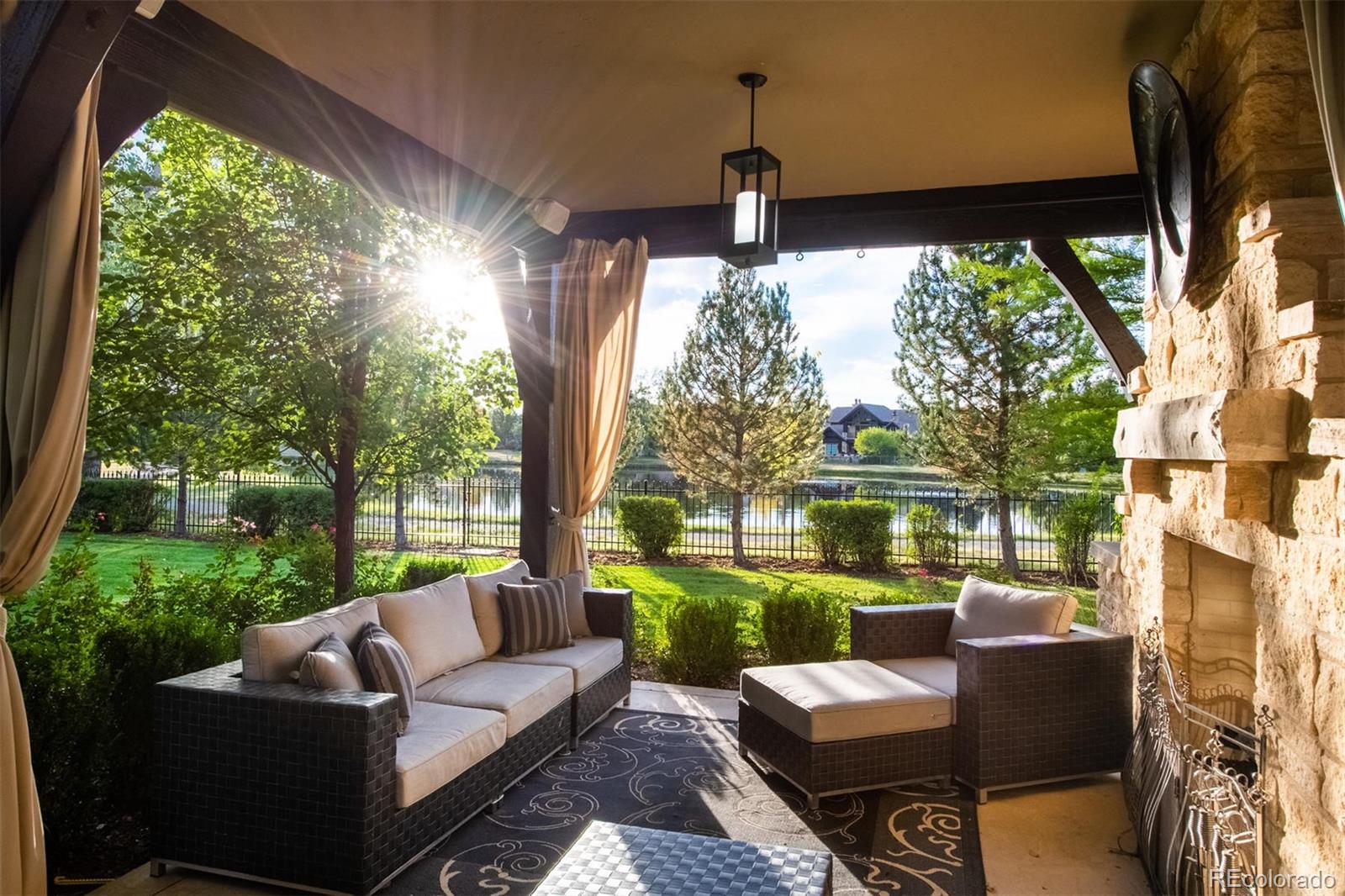 3 Sandy Lake Road Englewood, CO 80113 - Photo 29 of 35 a outdoor living space with patio fireplace furniture and garden view