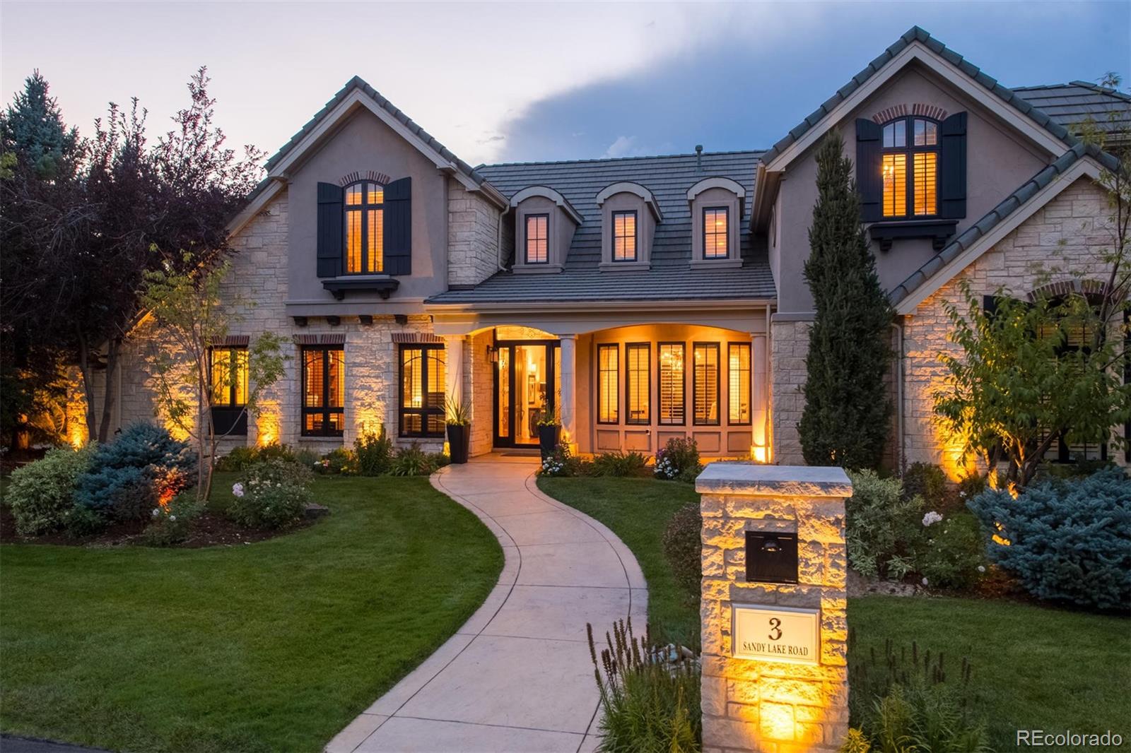 3 Sandy Lake Road Englewood, CO 80113 - Photo 3 of 35 a front view of a house with garden