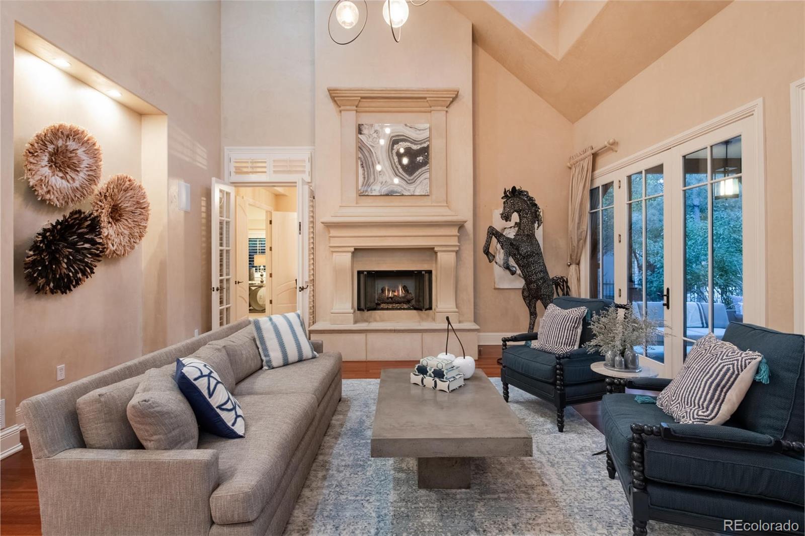 3 Sandy Lake Road Englewood, CO 80113 - Photo 7 of 35 a living room with furniture fireplace and a large window