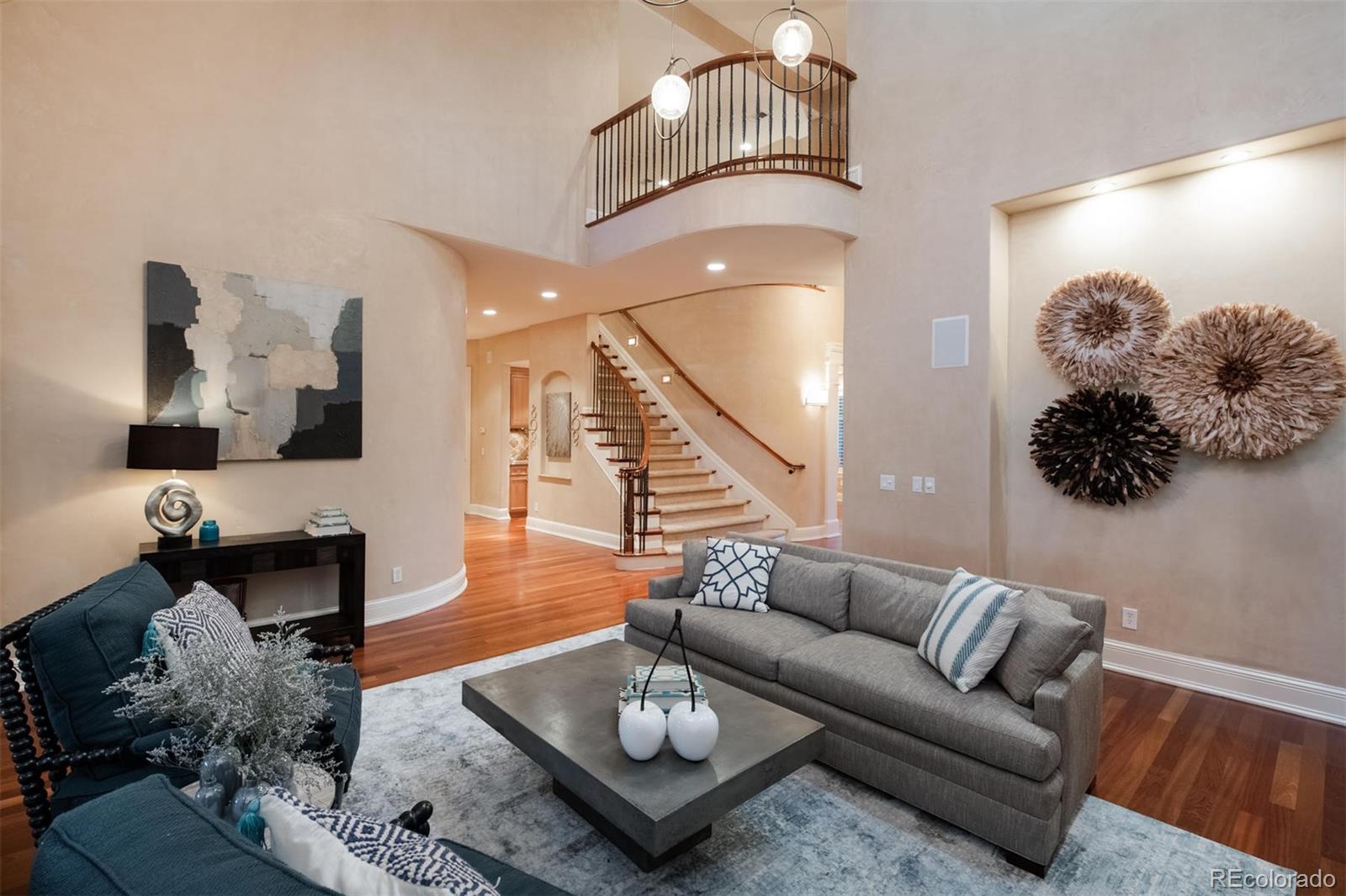 3 Sandy Lake Road Englewood, CO 80113 - Photo 8 of 35 a living room with furniture and wooden floor